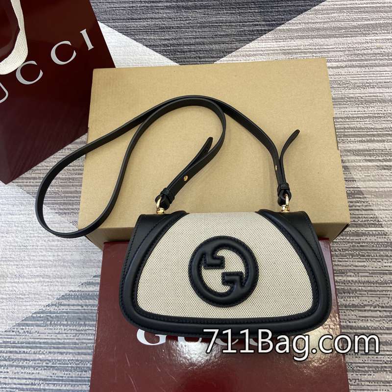 頂級A貨Gucci 815700 包面壓紋均勻精緻,無跳線。 高仿Gucci哪個版本好尺寸:21.5(長)x11(高)x8cm(厚)顏色:黑色/帆佈。 頂級A貨Gucci 815700 包面壓紋均勻精緻,無跳線。 高仿Gucci哪個版本好尺寸:21.5(長)x11(高)x8cm(厚)顏色:黑色/帆佈。