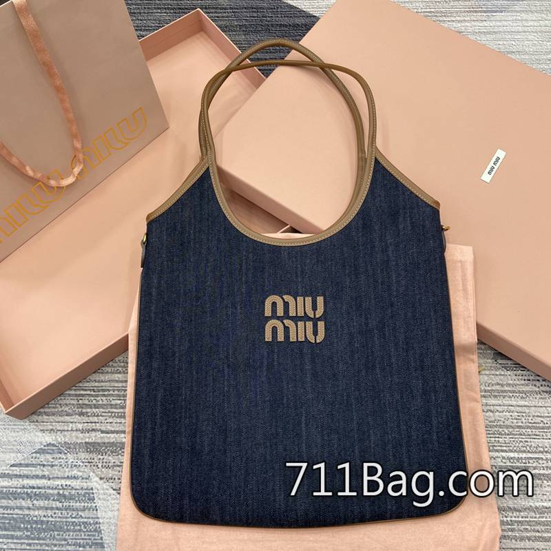 一比一MiuMiu 5BG231 社群曬圖款,高仿中的精品。 MiuMiu複製版包包尺寸:34(長)x40(高)顏色:黑色牛仔配棕色/原廠皮。 一比一MiuMiu 5BG231 社群曬圖款,高仿中的精品。 MiuMiu複製版包包尺寸:34(長)x40(高)顏色:黑色牛仔配棕色/原廠皮。