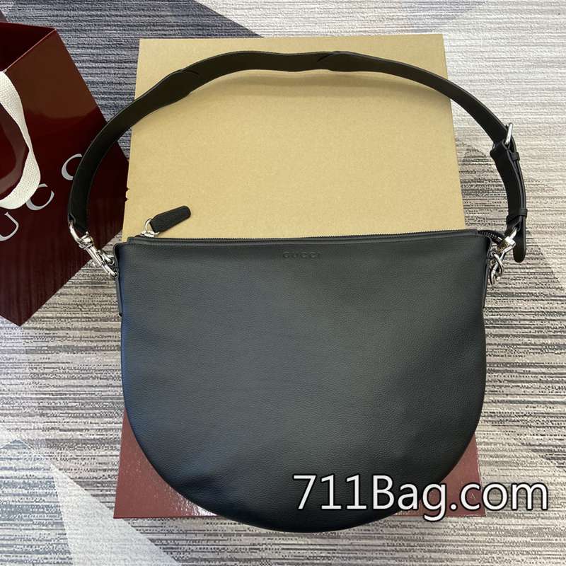 原版一比一Gucci 801887 高級面料手工包包 Gucci一比一A貨店鋪尺寸:40(長)x31(寬)x3(厚)顏色:黑色全皮/原廠皮。 原版一比一Gucci 801887 高級面料手工包包 Gucci一比一A貨店鋪尺寸:40(長)x31(寬)x3(厚)顏色:黑色全皮/原廠皮。