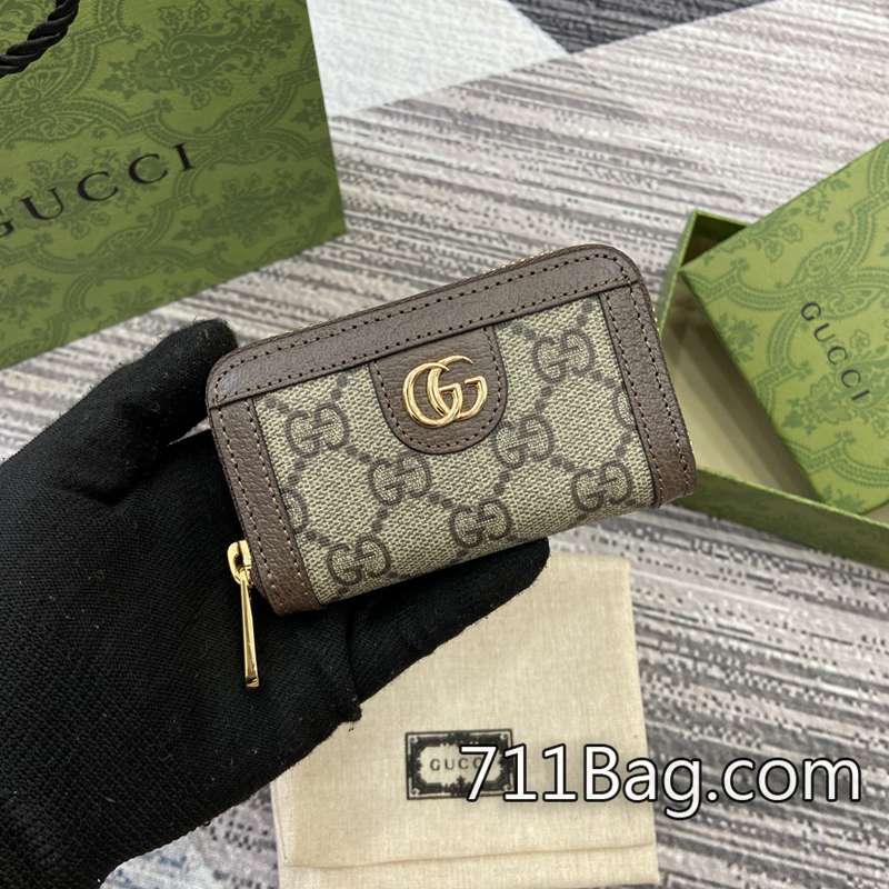 精品Gucci古馳 772307 五金精緻奢華包包 Gucci限量色A貨包尺寸:10.5(長)x7(寬)x2.5cm(厚)顏色:啡色/pvc。 精品Gucci古馳 772307 五金精緻奢華包包 Gucci限量色A貨包尺寸:10.5(長)x7(寬)x2.5cm(厚)顏色:啡色/pvc。