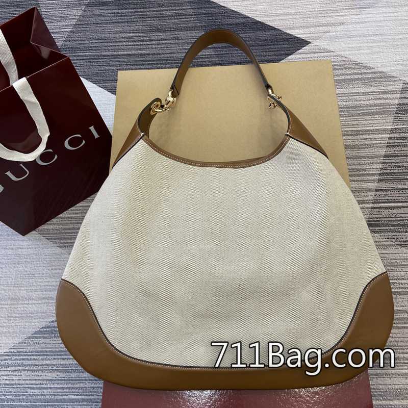 精品A貨Gucci古馳 815924 使用過後仍保持完美包型。 Gucci一比一A貨店鋪尺寸:49(長)x46(高)x4cm(厚)顏色:棕色/帆佈。 精品A貨Gucci古馳 815924 使用過後仍保持完美包型。 Gucci一比一A貨店鋪尺寸:49(長)x46(高)x4cm(厚)顏色:棕色/帆佈。