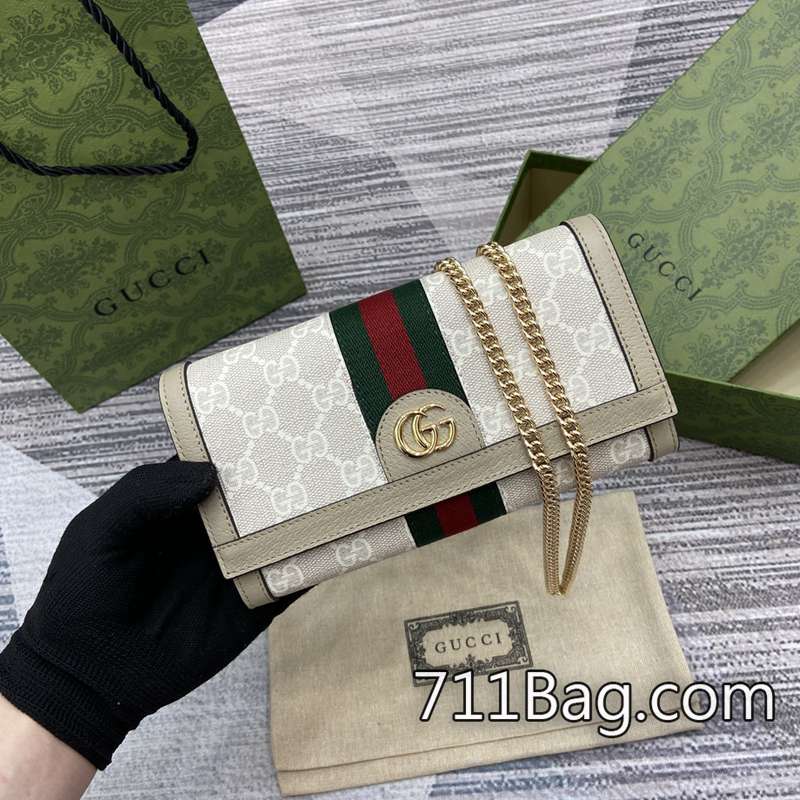 頂級高仿Gucci古馳 772309 超A品質,高仿界中的天花板。 旅行首選Gucci包包A貨尺寸:19x10x3.5厘米。顏色:燕麥色/pvc-711高仿包包,A貨包包